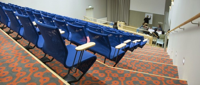 auditorium built-in seating furniture with desks